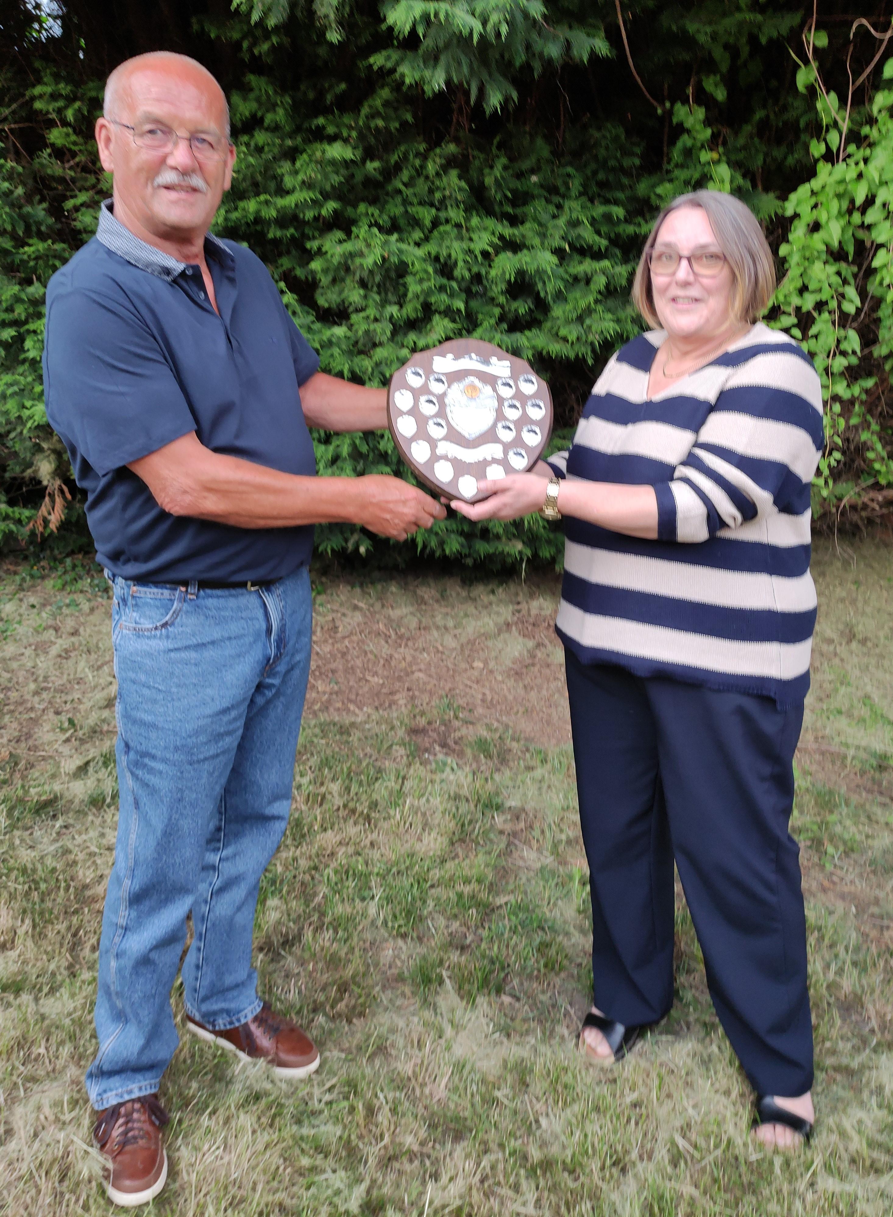 Kim Walker receives the Rogers Shield From Cllr John Papworth